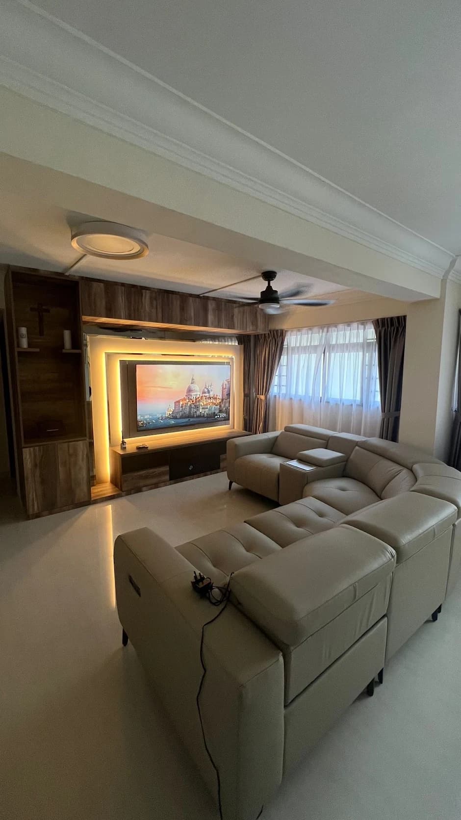 Living room feature wall and seating — MelvinGRaj Google review photo